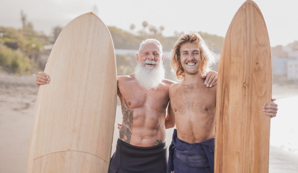 father and son surfers
