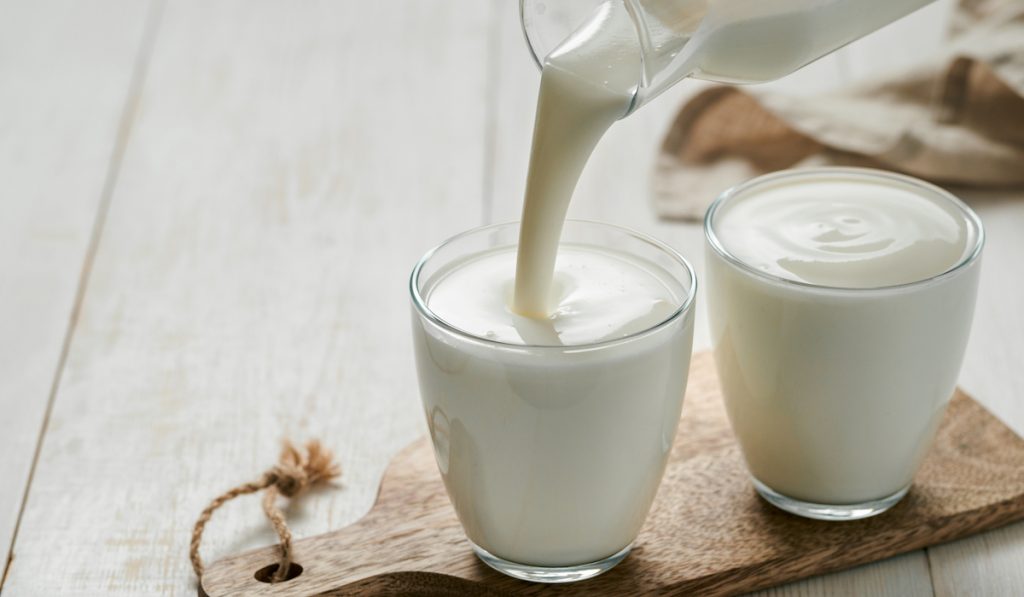 pouring homemade buttermilk