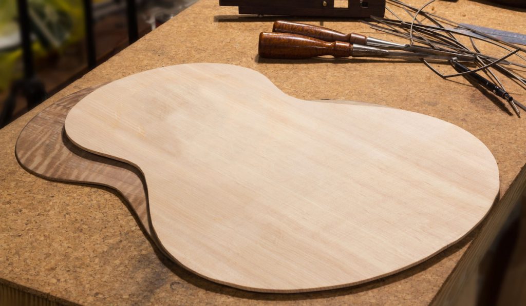 Making Guitar acoustic sitka spruce wood on table