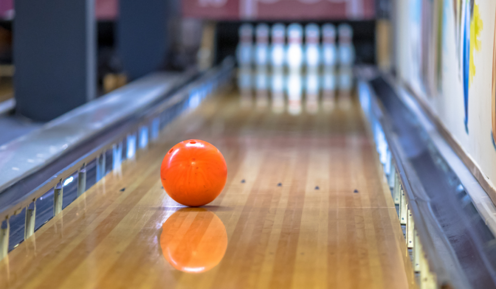 Bowling ball on alley in indoor bowling club

