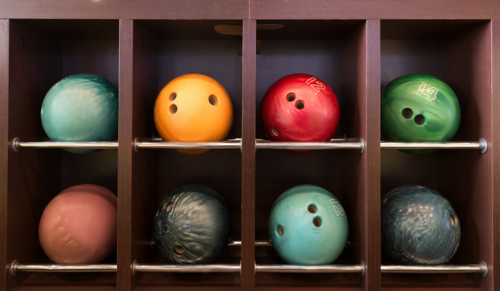 Bowling balls on the wooden shelf