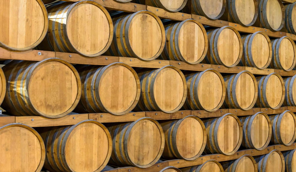 Wooden barrels in the wine cellar
