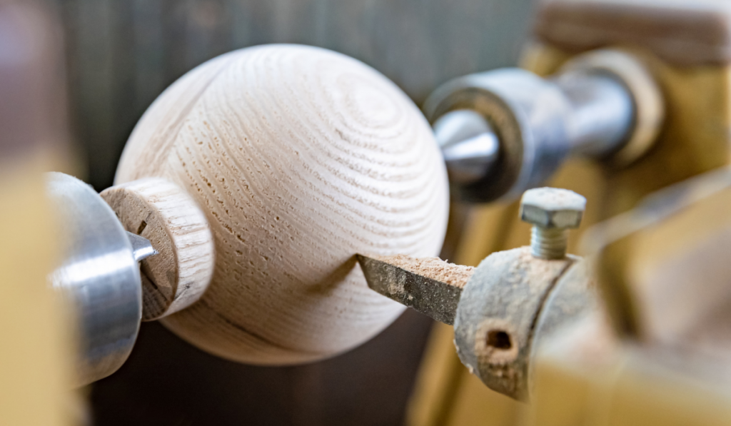 manufacture round wooden handles on lathe in joinery