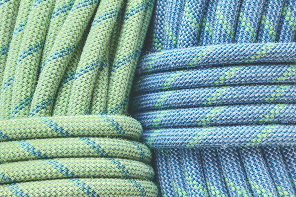 two climbing ropes green and blue
