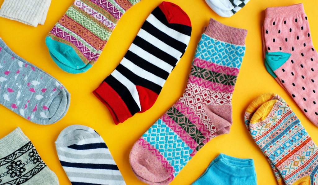 colorful socks on yellow background