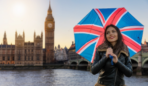 british woman holding an umbrella